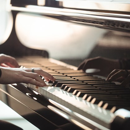 woman playing piano