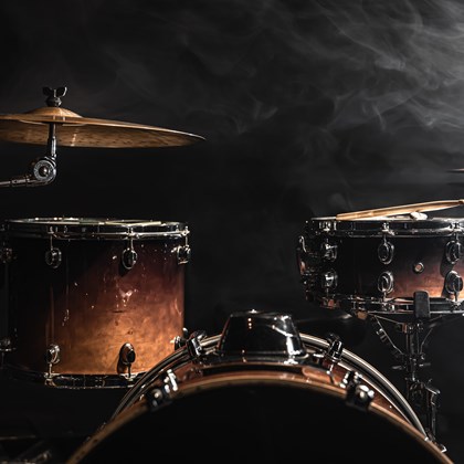 drum kit dark background with stage lighting copy space