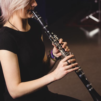 female student playing clarinet
